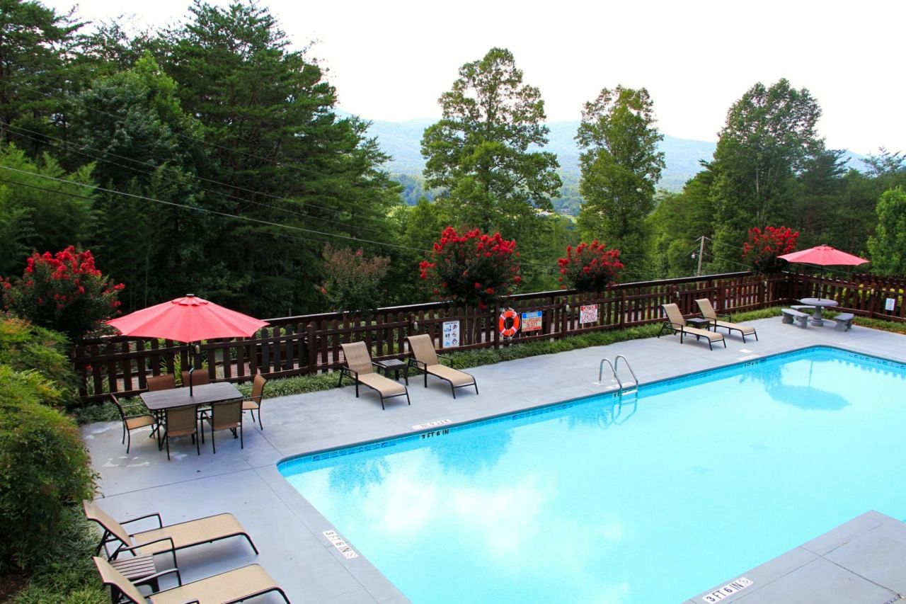 pool with lounge chairs