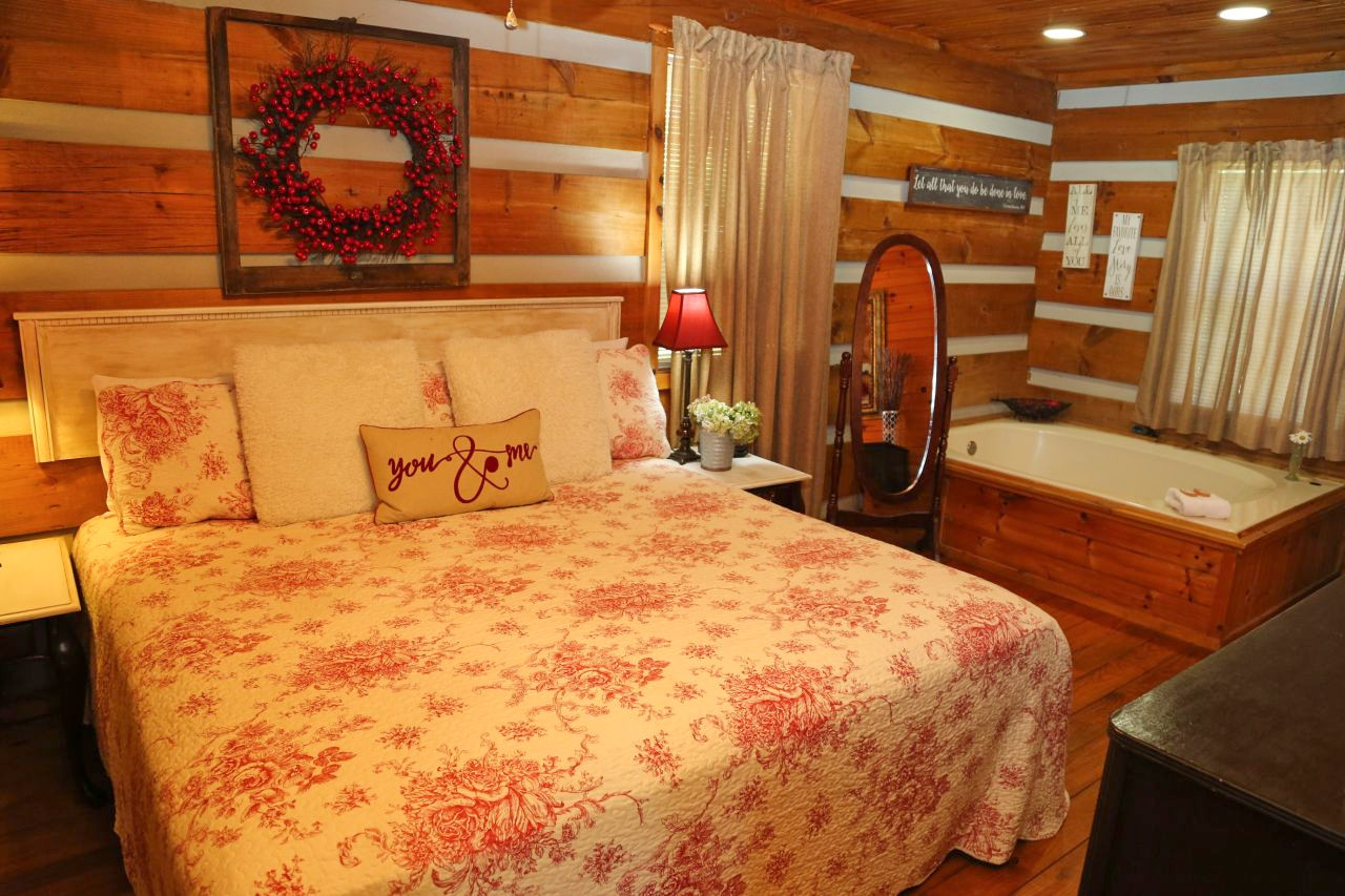 bedroom with hot tub