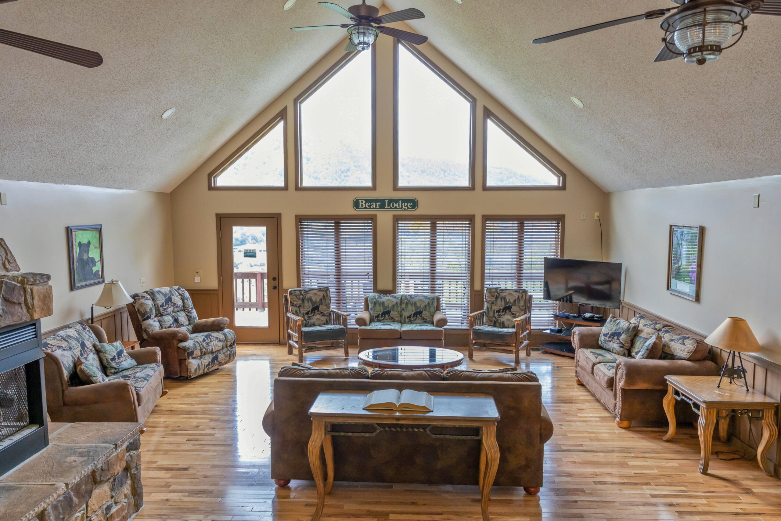 living room area with sofas and chairs