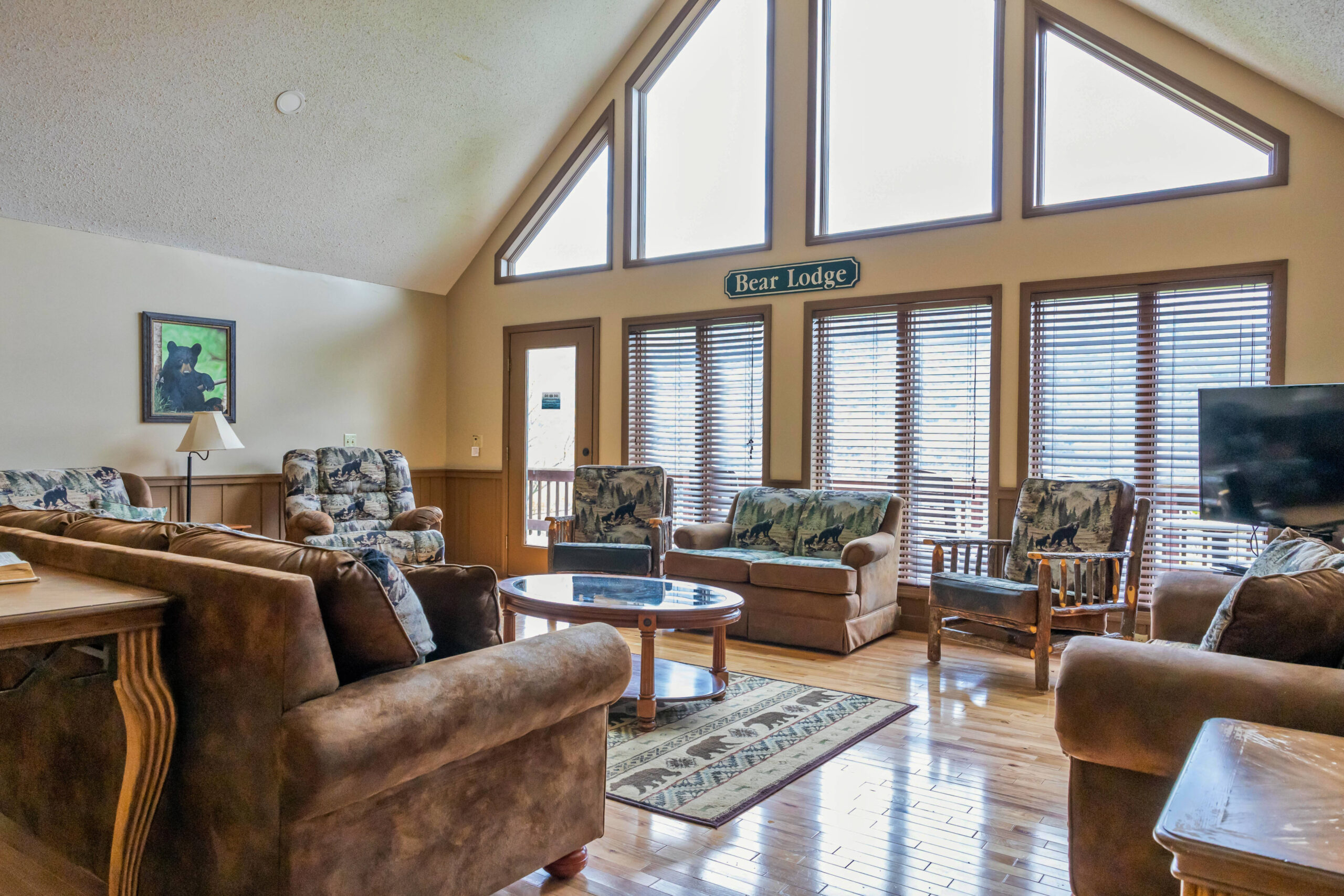 living room area with sofas and chairs